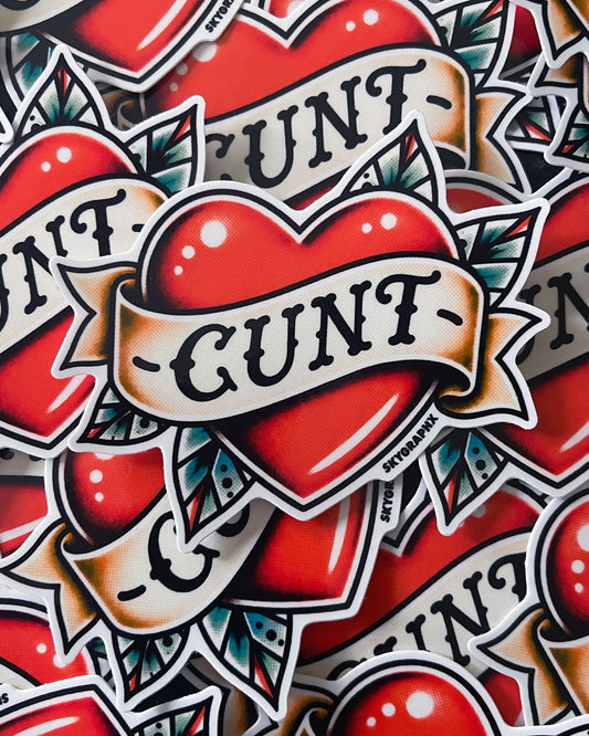 Sticker design with red hearts and 'CUNT' text on a patterned background