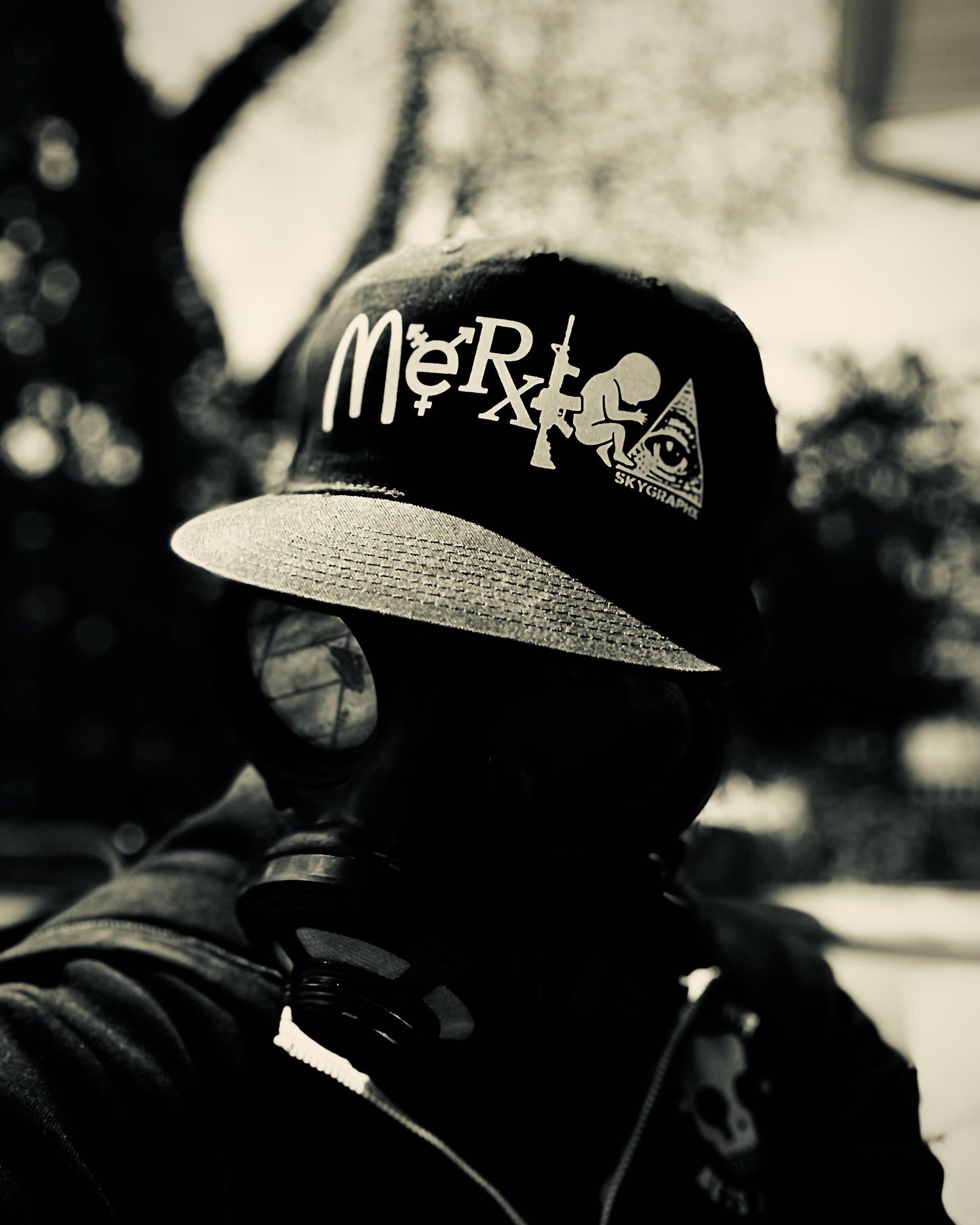 model wearing merica hat and gas mask