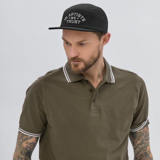 model wearing in artists we trust hat