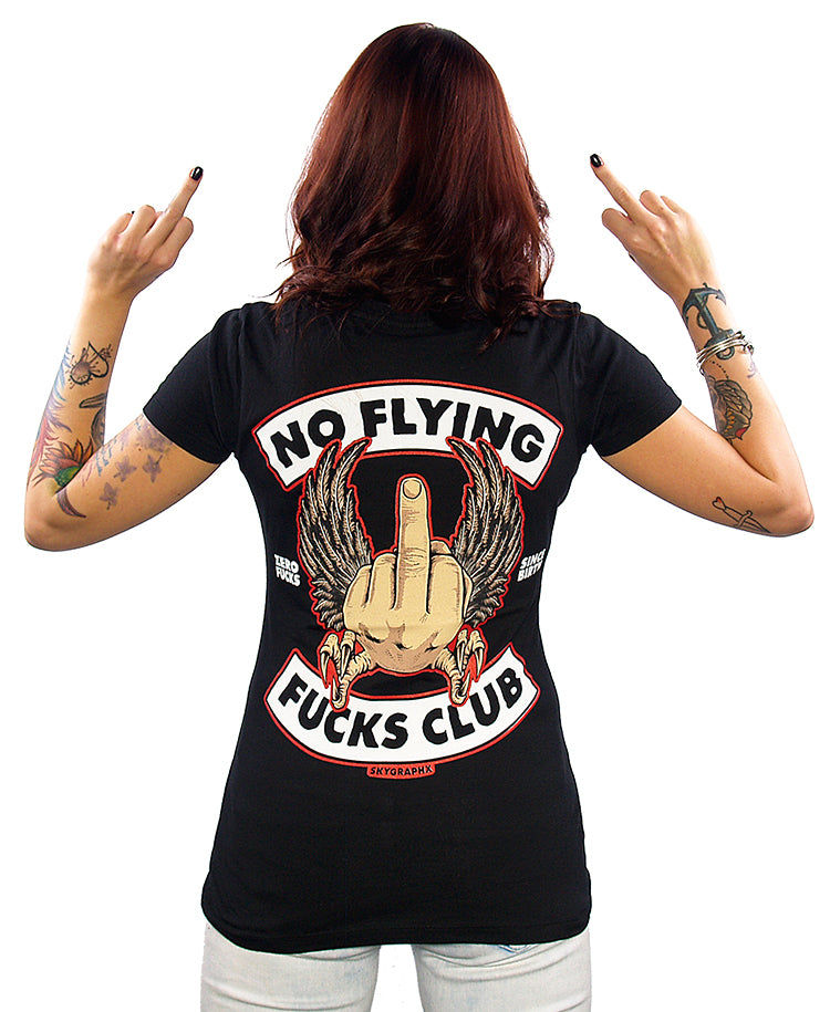 back view of model wearing no flying fucks shirt holding up middle fingers