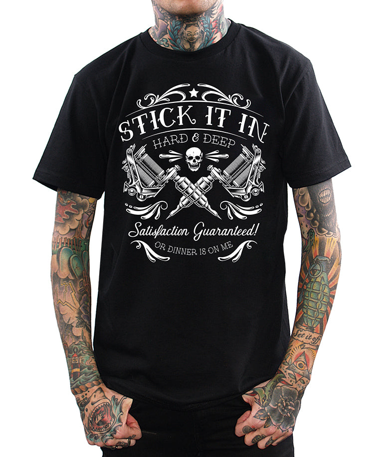 model wearing shirt with tattoo guns and says stick it in hard and deep satisfaction guaranteed or dinner is on me