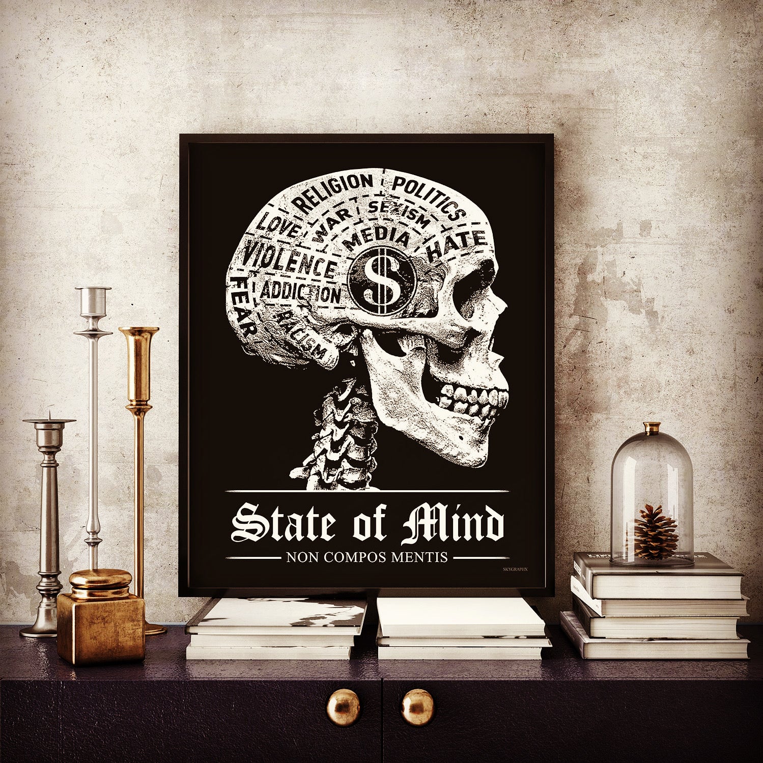 state of mind phrenology skull poster on table with books and candle holders