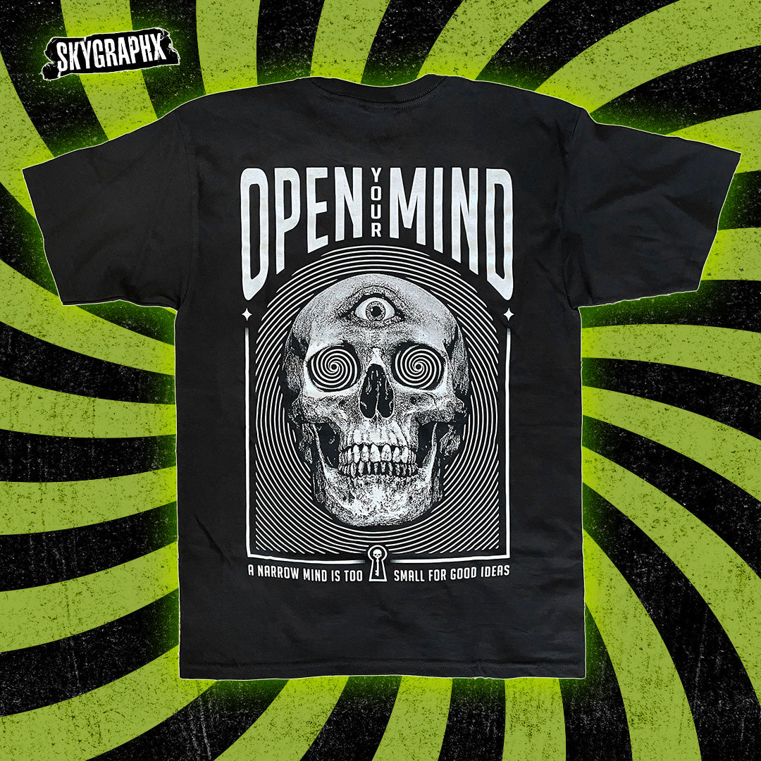shirt with open your mind text and trippy skull with 3 eyes on green and black swirl background