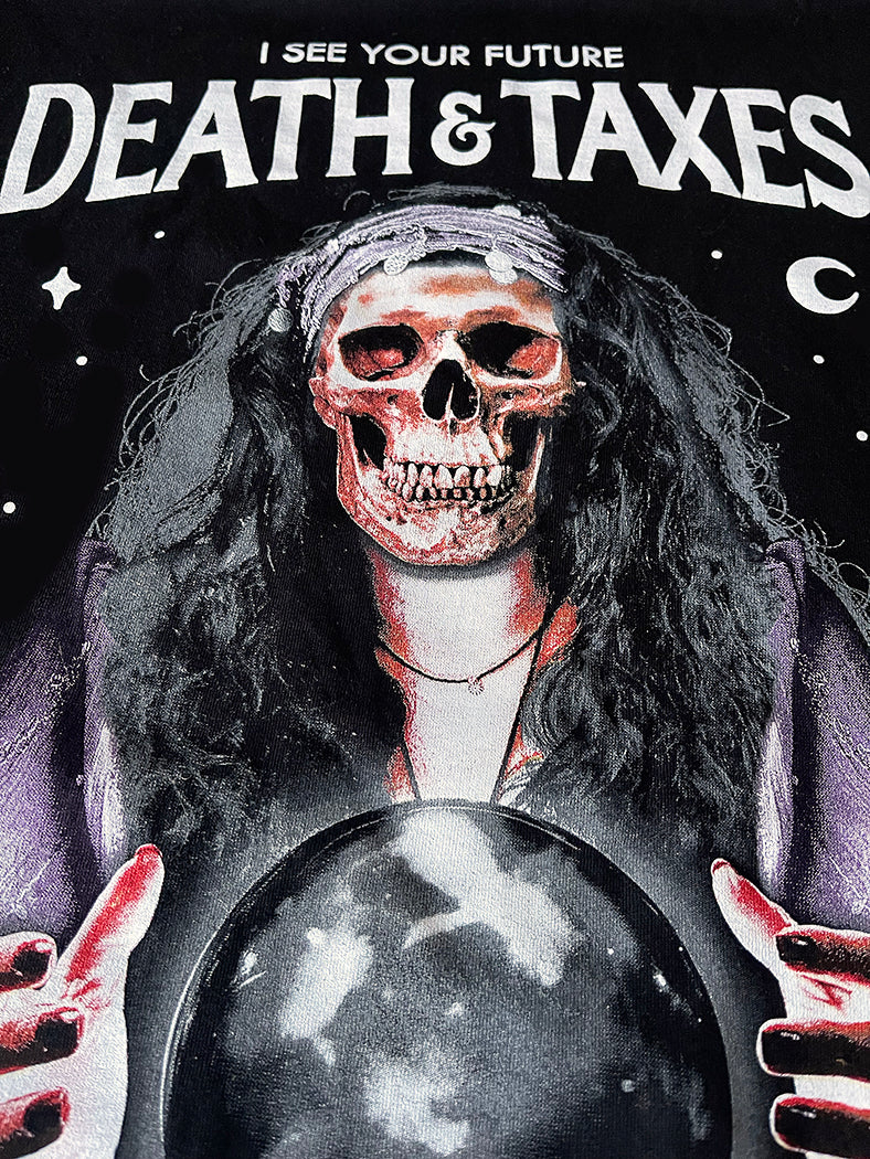 psychic with skull and crystal ball with I see your future death & taxes above head