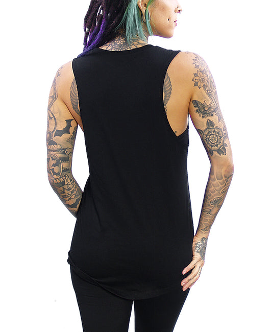 model wearing black tank top back view
