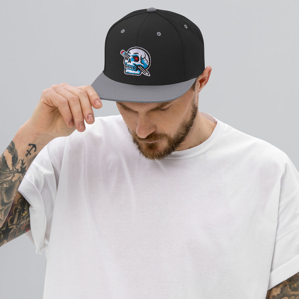 model wearing pencil skull hat