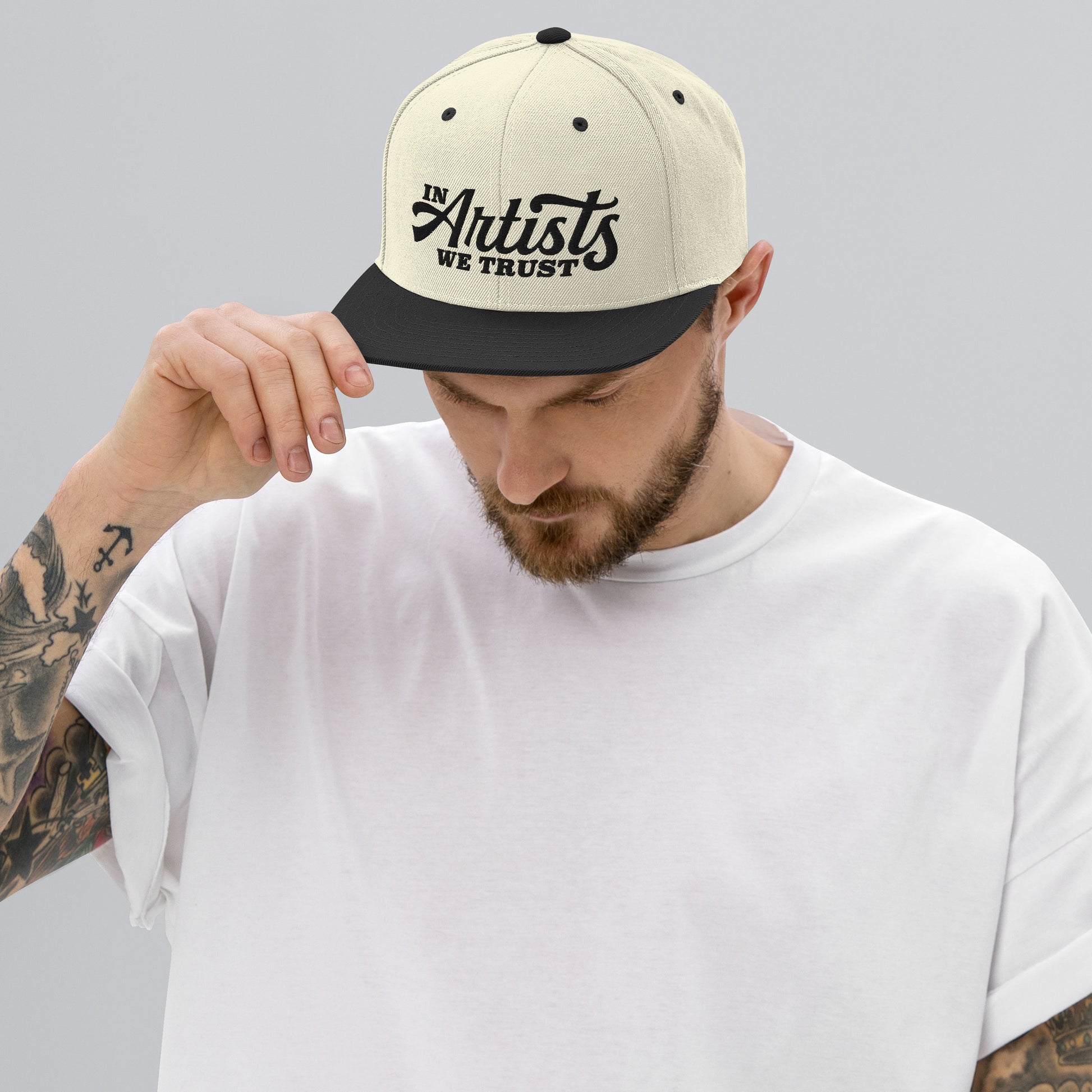 in artists we trust hat on model