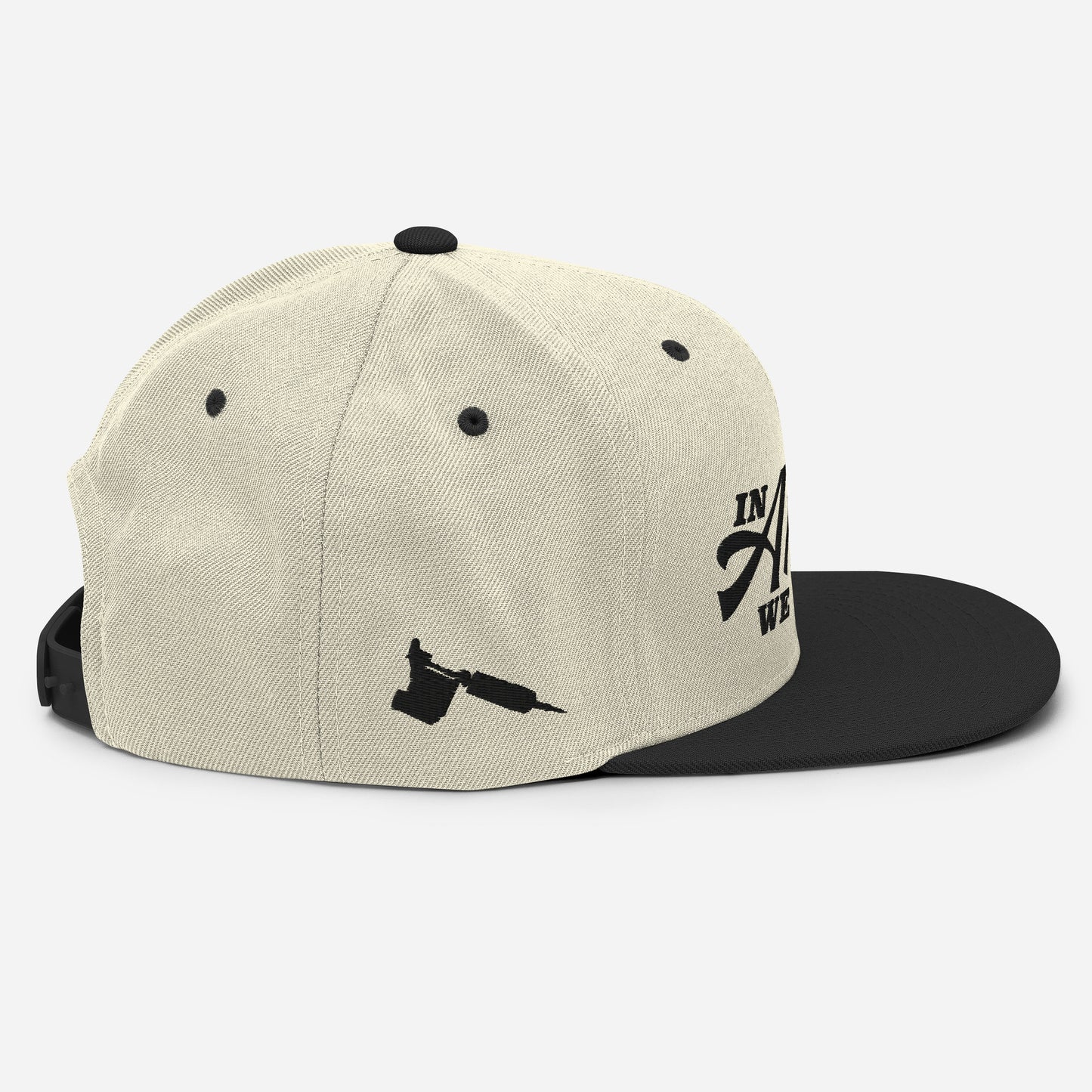side view of in artists we trust hat