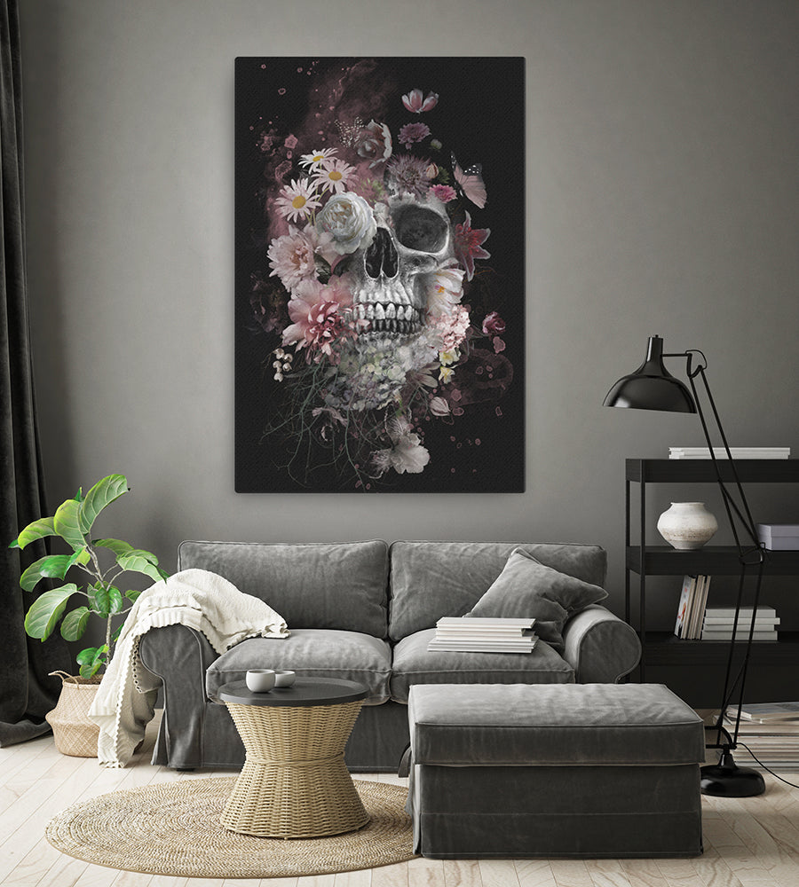 print of skull and flowers hanging in living room
