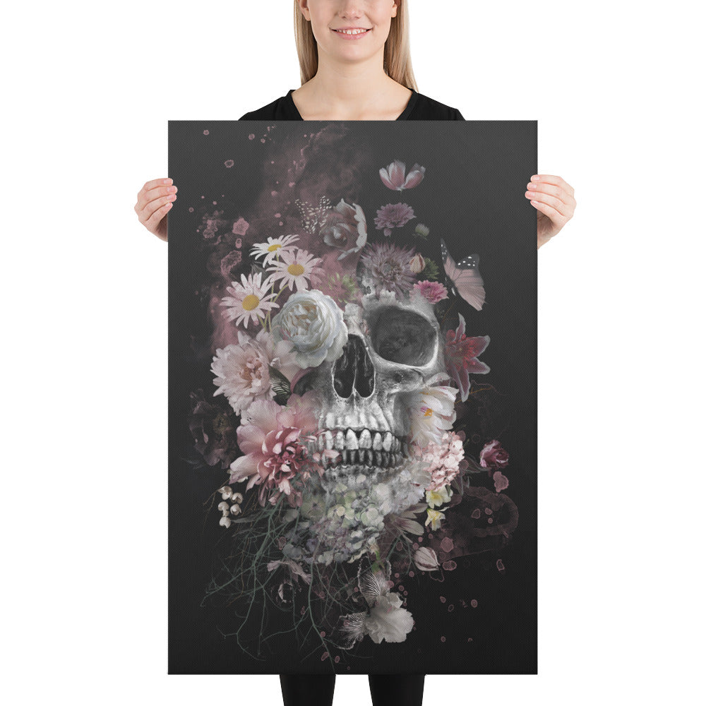 model holding canvas of skull and flowers