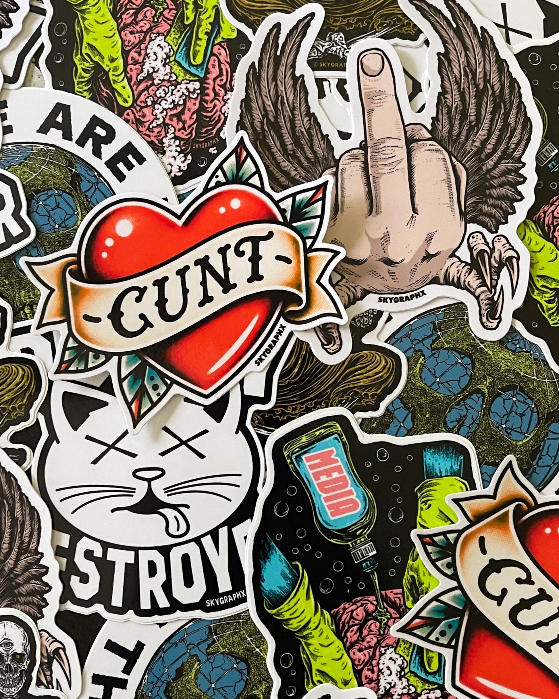 Collage of various graphic stickers with text and images on a dark background
