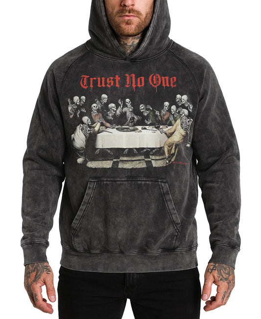 Person wearing a hoodie with a graphic design and text 'Trust No One' on a white background
